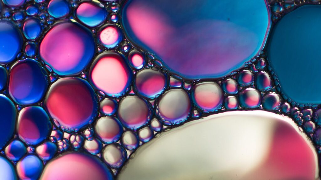 Colorful oil droplets in water